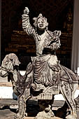 Bangkok Wat Arun - the gallery is lined all around with beautiful statues of chinese figures. 